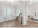 Inviting foyer with wood-look floors, stylish console table, and direct access to a mudroom at 13097 Arnold Palmer Cir # 844, Lancaster, SC 29720
