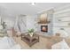 Bright living room with a stone fireplace, offering a comfortable and inviting atmosphere at 13097 Arnold Palmer Cir # 844, Lancaster, SC 29720