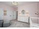 Cozy Bedroom with a floral rug, white furniture, soft pink walls, and ample closet space at 13103 Union Square Dr, Huntersville, NC 28078