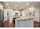 Spacious kitchen with central island, granite countertops, and stainless steel appliances at 13103 Union Square Dr, Huntersville, NC 28078