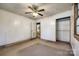 This bedroom features neutral walls and carpet with closet and ceiling fan at 1430 Bose Ave, Rock Hill, SC 29732