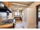 Functional kitchen with ample counter space and views into a bright room, perfect for future updates at 1430 Bose Ave, Rock Hill, SC 29732