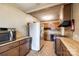 Well-organized kitchen layout with essential appliances and ample storage, awaiting a modern transformation at 1430 Bose Ave, Rock Hill, SC 29732