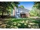 Large, grassy backyard with a spacious deck perfect for outdoor gatherings at 145 Meadow Pond Ln, Mooresville, NC 28117