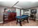 Basement area featuring a pool table and pinball machine for Gathering fun and games at 145 Meadow Pond Ln, Mooresville, NC 28117