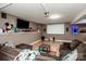 Finished basement featuring a home theater setup and cozy seating area, perfect for entertainment and relaxation at 145 Meadow Pond Ln, Mooresville, NC 28117