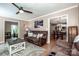 Cozy living room flowing into dining area, featuring comfortable seating, stylish coffee table, and ample natural light at 145 Meadow Pond Ln, Mooresville, NC 28117