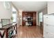Office area boasting built-in shelving, hardwood floors, and natural light at 145 Meadow Pond Ln, Mooresville, NC 28117