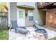 Cozy patio with lounge chairs and fire pit, perfect for relaxing evenings at 145 Meadow Pond Ln, Mooresville, NC 28117