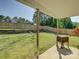 Lovely covered patio featuring outdoor space and lush green lawn and privacy fence at 1488 Meadow Glen Ln, Rock Hill, SC 29730