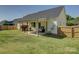 Spacious backyard featuring a covered patio with plenty of room to relax and entertain guests at 1488 Meadow Glen Ln, Rock Hill, SC 29730