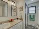 Bright bathroom featuring double vanity, neutral countertops, and matching framed mirrors and artwork at 1488 Meadow Glen Ln, Rock Hill, SC 29730