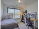 Cozy bedroom featuring a twin bed, natural light, a desk and decorative artwork at 1488 Meadow Glen Ln, Rock Hill, SC 29730