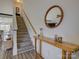 Bright entryway featuring wood-look floors, a staircase, and stylish wooden decor at 1488 Meadow Glen Ln, Rock Hill, SC 29730