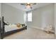 Serene bedroom featuring soft carpeting, and a comfortable twin bed at 15312 Ravenall Dr, Huntersville, NC 28078