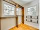 Walk-in closet with wood trim, clothing racks, and natural light from two windows at 1540 Neely Store Rd, Rock Hill, SC 29730
