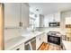 Updated kitchen with white cabinets, stainless steel appliances, subway tile backsplash, and stainless steel sink at 1540 Neely Store Rd, Rock Hill, SC 29730