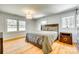 Spacious main bedroom with hardwood floors, natural light, and neutral decor at 1540 Neely Store Rd, Rock Hill, SC 29730