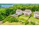 Aerial view of two homes and waterfront property on Lake Wylie, highlighting their scenic location and features at 17231 Rider Wood Ln, Charlotte, NC 28278