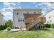 Expansive backyard featuring a deck and patio, creating a seamless transition between indoor and outdoor living at 17231 Rider Wood Ln, Charlotte, NC 28278