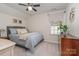 Serene bedroom with soft bedding, a decorative mirror, and ample natural light at 17231 Rider Wood Ln, Charlotte, NC 28278