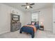Cozy bedroom featuring charming decor, soft carpet, and a ceiling fan at 17231 Rider Wood Ln, Charlotte, NC 28278