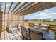 An inviting deck with a pergola and a view of the neighborhood provides a perfect place for outdoor enjoyment at 17231 Rider Wood Ln, Charlotte, NC 28278