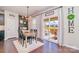 Charming dining area with sliding glass doors to a spacious outdoor deck, perfect for entertaining and relaxation at 17231 Rider Wood Ln, Charlotte, NC 28278