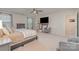 Bright main bedroom with ample natural light, a ceiling fan, and views to the outside at 17231 Rider Wood Ln, Charlotte, NC 28278