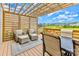 Inviting outdoor deck with comfortable seating, a pergola, and a view of the neighborhood, ideal for relaxation at 17231 Rider Wood Ln, Charlotte, NC 28278