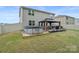 Backyard with a gazebo, hot tub and manicured landscape at 179 Bezelle Ave # 34, York, SC 29745