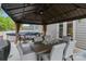 Patio gazebo featuring a ceiling fan, dining table, and chairs at 179 Bezelle Ave # 34, York, SC 29745