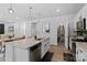 A bright, modern kitchen features granite countertops, a stainless steel dishwasher, and a well-stocked pantry at 179 Bezelle Ave # 34, York, SC 29745