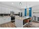 Modern kitchen with white cabinetry, granite countertops, stainless steel appliances, and a breakfast bar at 179 Bezelle Ave # 34, York, SC 29745