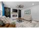 The living room includes a fireplace, modern furniture, and a ceiling fan at 179 Bezelle Ave # 34, York, SC 29745