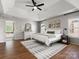 Spacious main bedroom featuring a trey ceiling and ensuite bathroom at 2002 Potomac Rd, Indian Trail, NC 28079