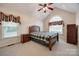 Spacious bedroom with vaulted ceilings, a large window, and plush carpet flooring at 2199 Lookout Pt, Rock Hill, SC 29732