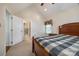 Bedroom suite with neutral carpet, traditional windows and an ensuite bathroom at 2199 Lookout Pt, Rock Hill, SC 29732