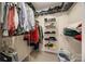 Organized walk-in closet with ample shelving and hanging space for storage at 2199 Lookout Pt, Rock Hill, SC 29732