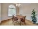 Dining room with natural light with hardwood flooring and a view to backyard at 2199 Lookout Pt, Rock Hill, SC 29732