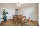 Dining room featuring hardwood floors, decorative molding, and neutral color palette at 2199 Lookout Pt, Rock Hill, SC 29732