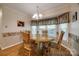 Bright dining area with bay window and traditional furnishings creating a cozy atmosphere at 2199 Lookout Pt, Rock Hill, SC 29732
