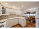 Bright eat-in kitchen with a tile counters, white cabinets and stainless steel appliances at 2199 Lookout Pt, Rock Hill, SC 29732