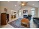 Bright living room with vaulted ceiling, fireplace, and access to outdoor spaces at 2199 Lookout Pt, Rock Hill, SC 29732