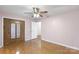 This bedroom includes hardwood floors, neutral paint, and a closet at 319 Hatley Ne Cir, Concord, NC 28025