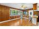 Bright living room with hardwood floors and natural light streaming in from large windows at 319 Hatley Ne Cir, Concord, NC 28025