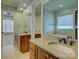 This bathroom features a double vanity, granite counters, and a large soaking tub at 324 Quinby Way, Rock Hill, SC 29732