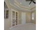 Spacious bedroom featuring a ceiling fan, recessed lighting, and French doors at 324 Quinby Way, Rock Hill, SC 29732