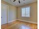 Bedroom with hardwood floors and large window at 324 Quinby Way, Rock Hill, SC 29732