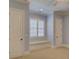 Bright bedroom with window seat and neutral carpet at 324 Quinby Way, Rock Hill, SC 29732